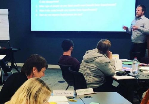 students looking at presentation slides